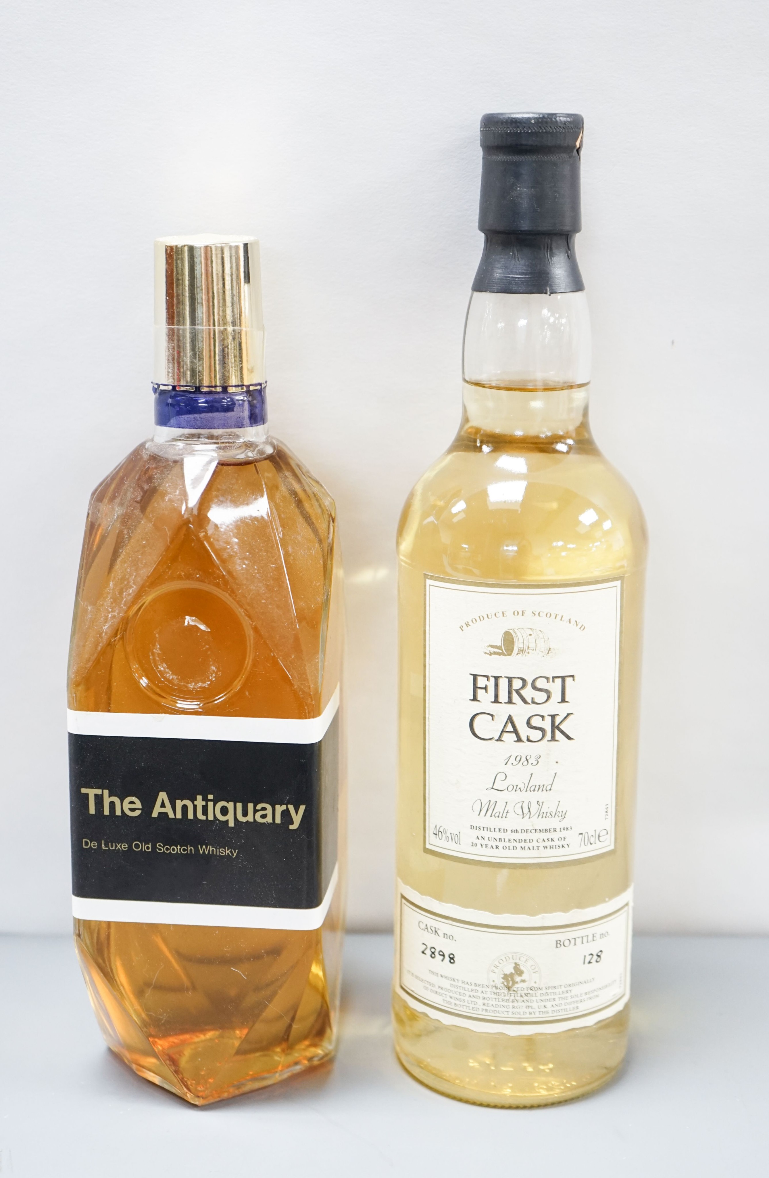 A bottle of First Cask 1983 Lowland whisky, no.128 and a bottle of The Antiquary whisky